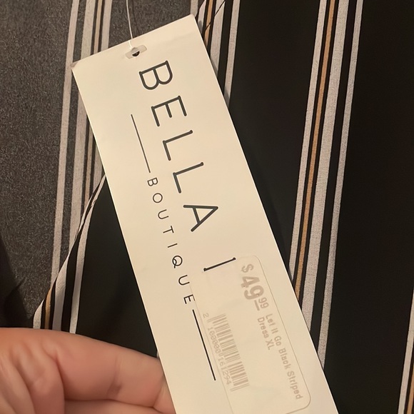 Striped dress with ruffle details - Picture 5 of 7